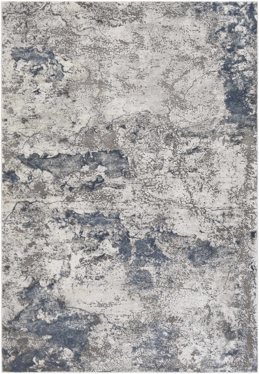 Close-up of the Ainslie Gray Marble Rug, showing its charcoal, navy, and white abstract pattern. Design-Rectangle-5376