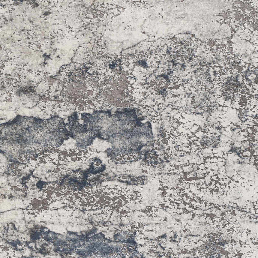 Close-up of the Ainslie Gray Marble Rug showing its charcoal, denim, and white marbled pattern. Swatch