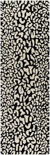 Close-up of the Akeem Leopard Print Area Rug. Beige wool spots on a dark gray background create a contemporary animal print. Design-Runner-268