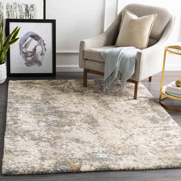 Living room scene with Alabaster Abstract Thick Luxe Rug, gray chair, gold side table, and modern art. Neutral, contemporary style. Roomscene-Rectangle