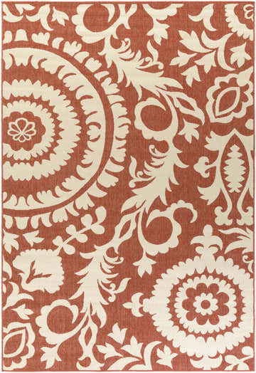 Close-up of the Alburnett Burnt Orange Floral Rug. Brick red olefin rug with a light beige traditional floral pattern. Design-Rectangle-76109