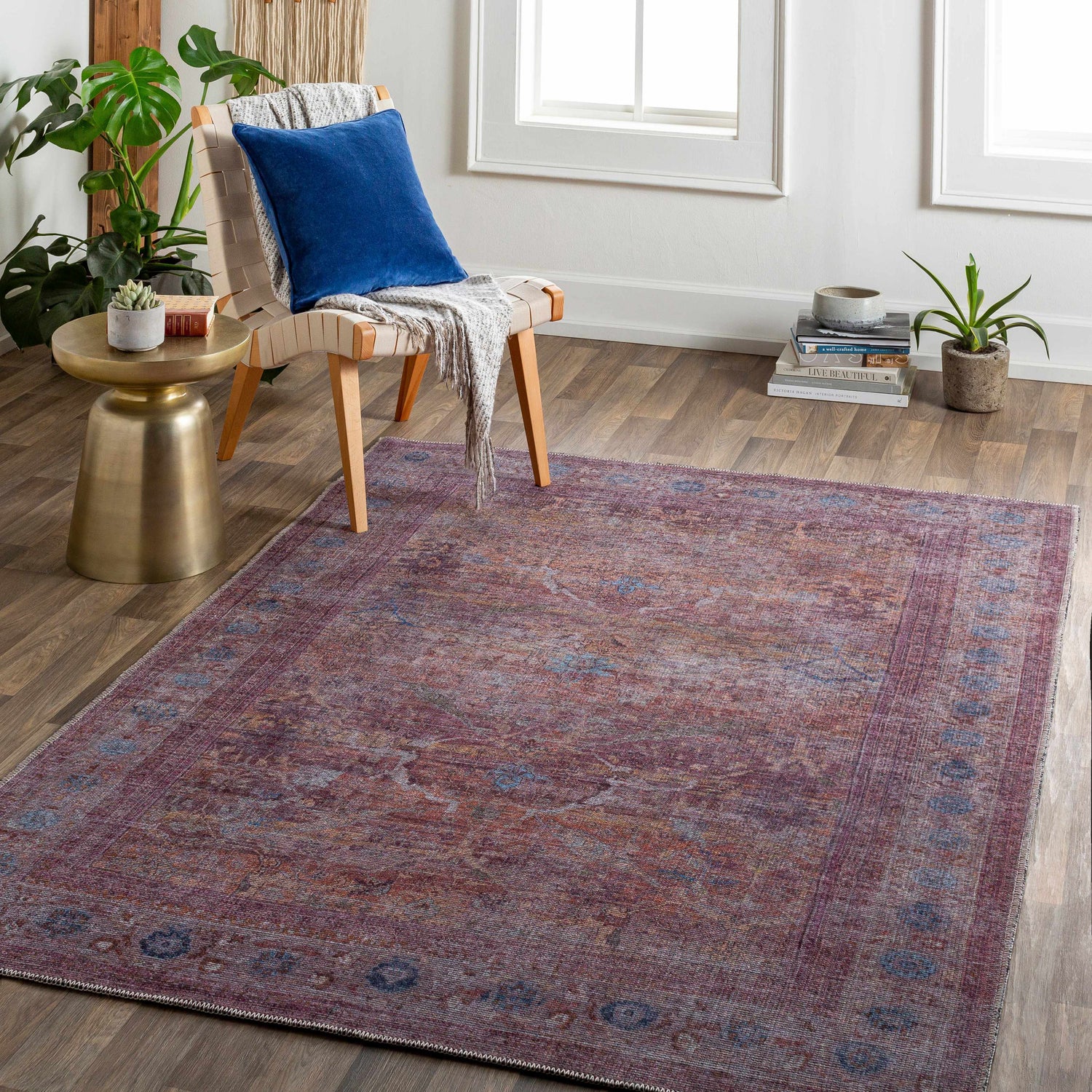 Living room scene with Alcoy Washable Area Rug in dark purple, multi brown, pale pink, walnut, and white thatch colors. Roomscene-Rectangle