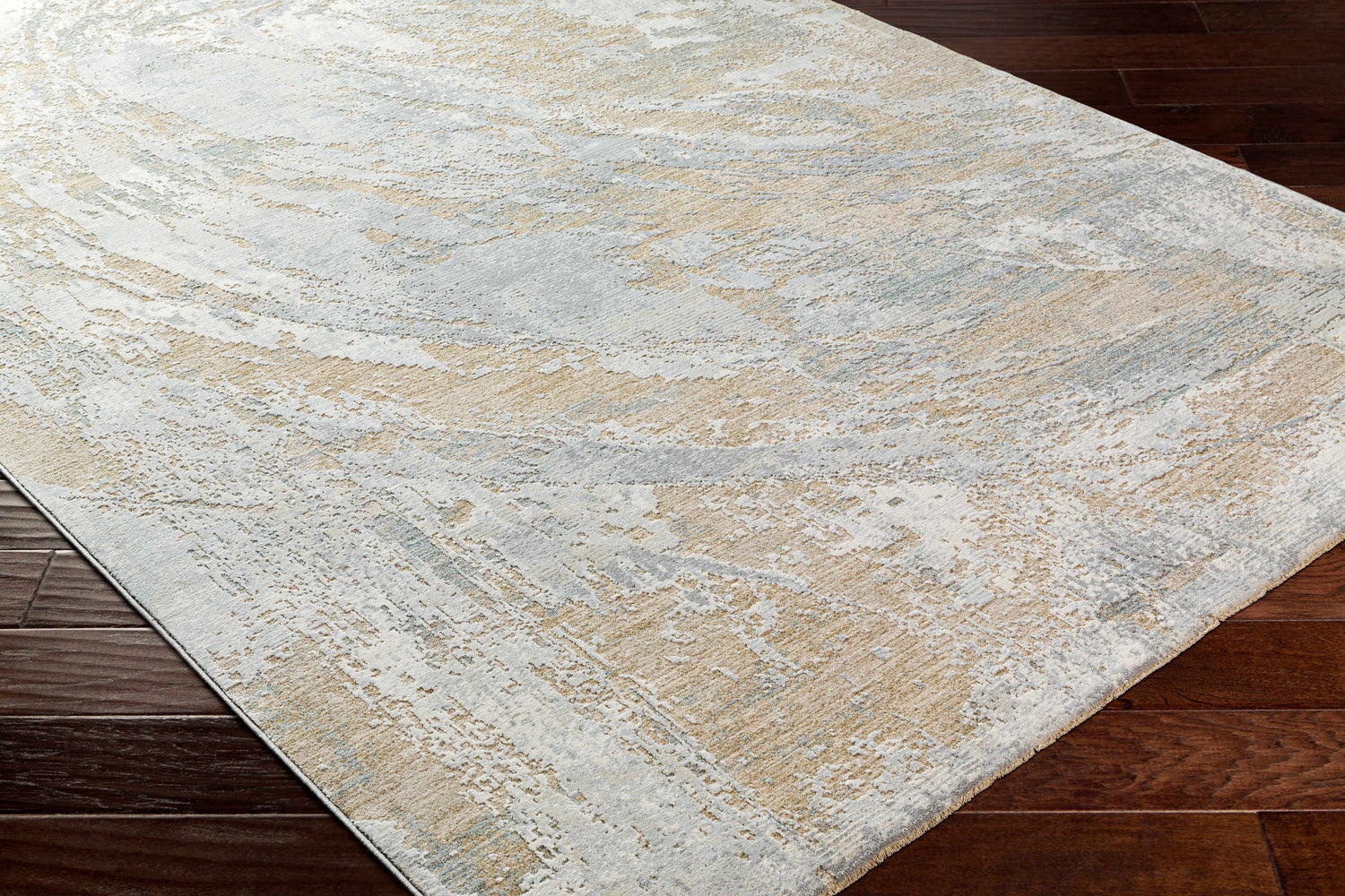 Close-up of the Ambra Thick Luxe Boutique Rug showcasing its cloud gray, light gray, and brown abstract pattern. Corner
