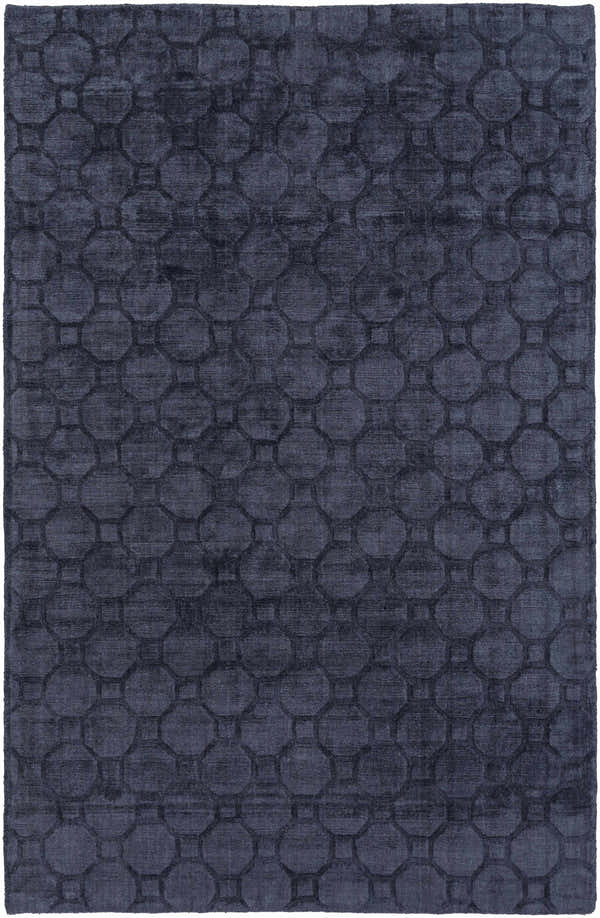 Close-up of the Annan Area Rug in ink blue, featuring a contemporary geometric octagon pattern. Design-Rectangle-576