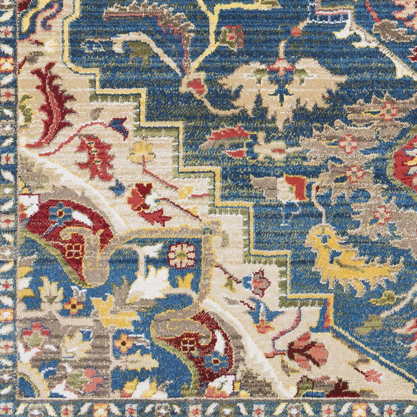 Close up of the Argyle Area Rug, showing a traditional oriental pattern in blue, red, tan, and yellow. Swatch