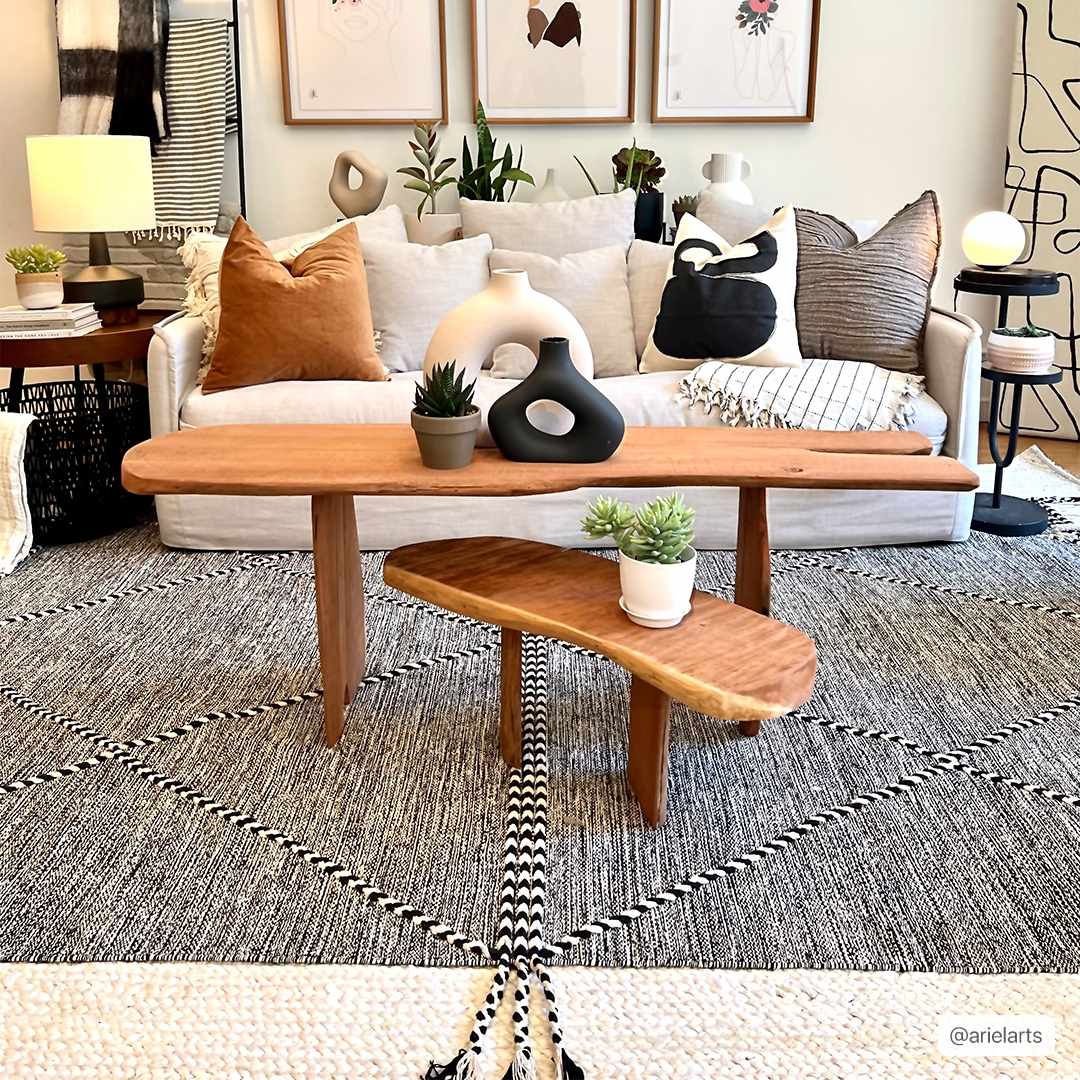 Bohemian living room with a Spottswood Area Rug, wood coffee table, and cream sofa with decorative pillows. Roomscene-Rectangle