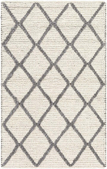 Close-up of the Arlesey Carpet, a cream and charcoal hand-woven rug with a contemporary diamond pattern. Design-Rectangle-23