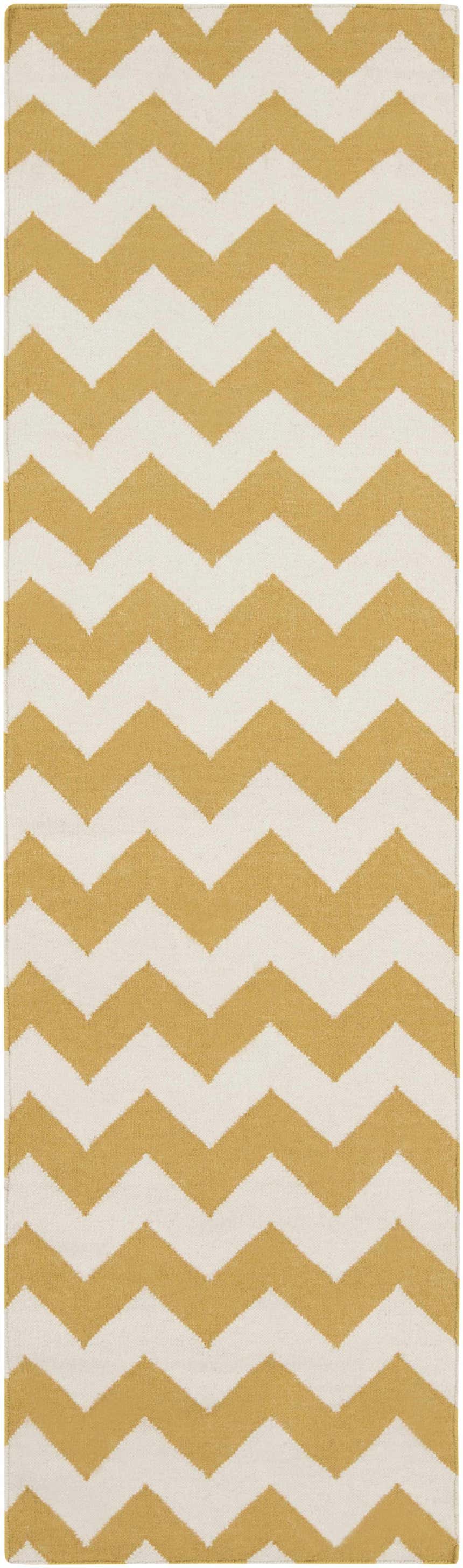 Close-up of the Arvada Area Rug, a hand-woven wool rug with a cream and mustard chevron pattern. Design-Runner-268