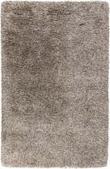 Close-up of the Ascot Area Rug. Beige, charcoal, and olive shag rug with a hand-woven texture. Design-Rectangle-58