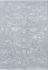 Close-up of the Astatula Area Rug. Blue rug with ice blue, ivory, and light gray traditional floral pattern. Design-Rectangle-5376