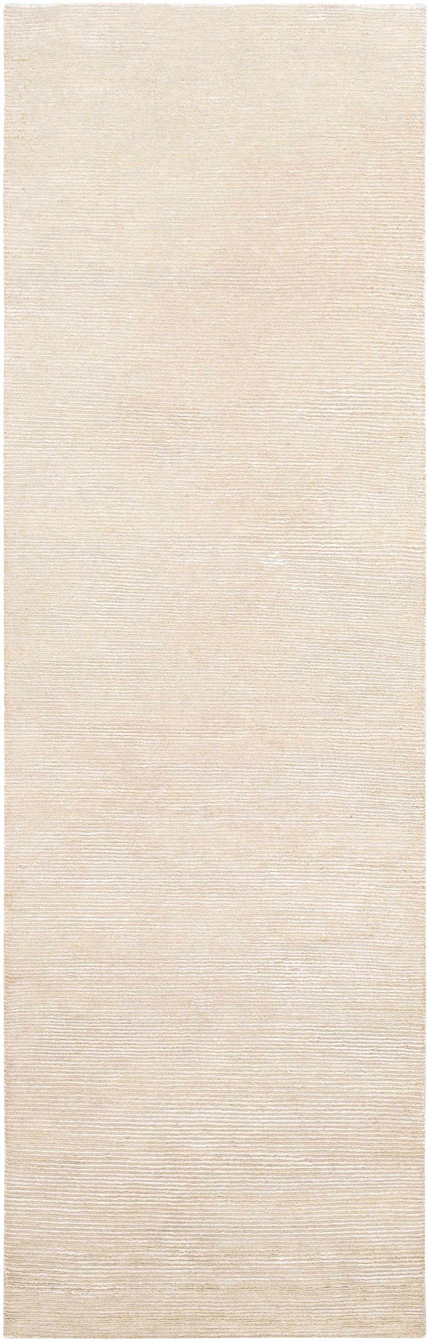 Close-up of the beige Atlas Carpet, hand-knotted with a subtle horizontal pattern and a soft, inviting texture. Design-Runner-268