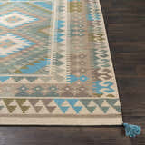 Close up of Auchterarder Carpet. Hand woven wool rug with aqua, blue, sage, and brown geometric pattern. Farmhouse style. Front