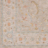 Close-up of the Awena Thick Luxe Area Rug with a traditional floral pattern in amber, dusty pink, and light olive on a taupe background. Swatch