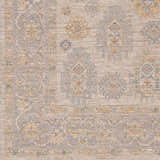 Close-up of the Ayele Thick Luxe Statement Rug showing its traditional pattern in charcoal, gray, and mustard tones. Swatch