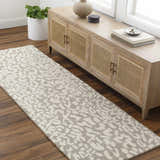 Entryway with wood floors, a console table, and the beige Azuka Leopard Print Area Rug runner. Roomscene-Runner