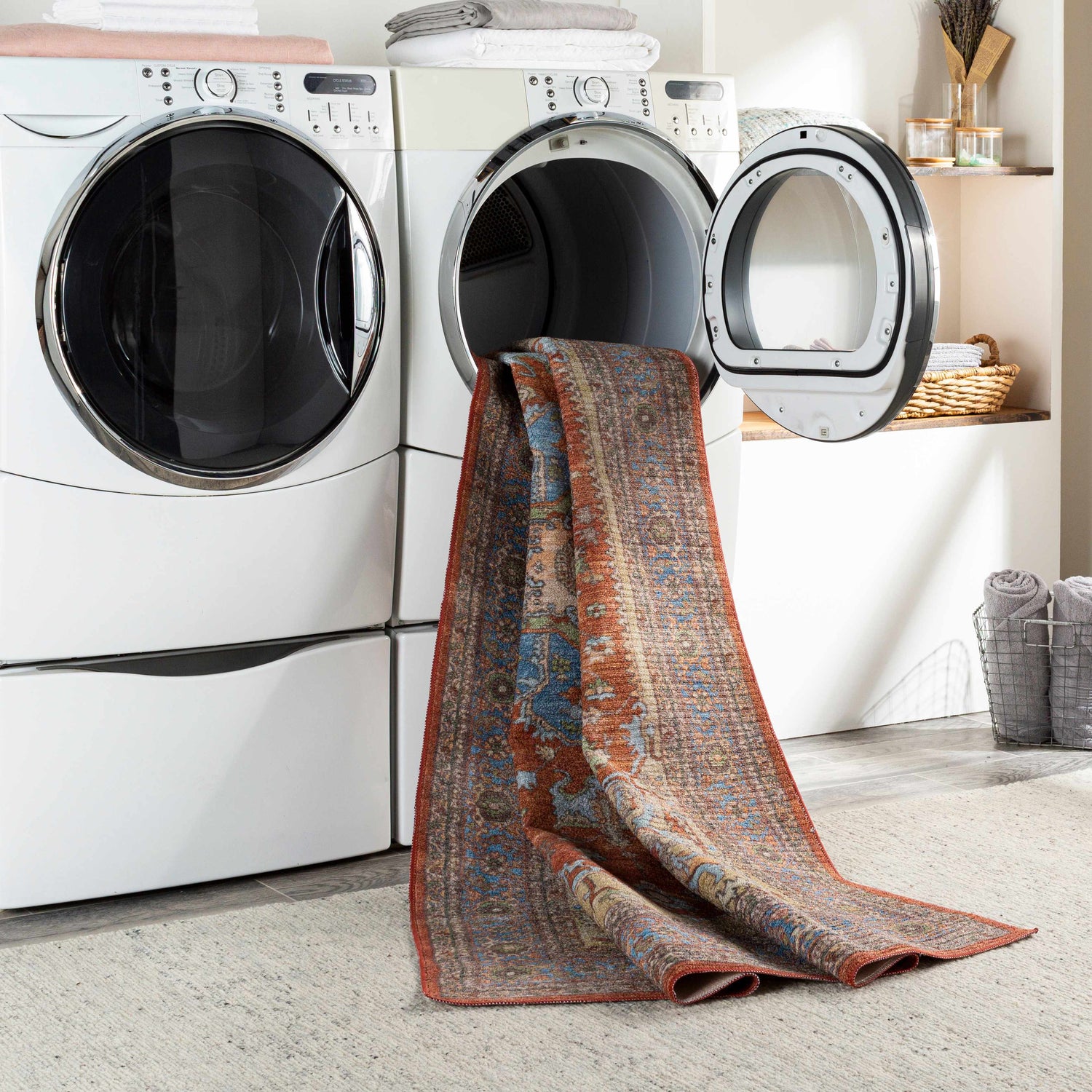 Bacoor Washable Area Rug in a laundry room, coming out of the dryer. Beige, brick red, and denim oriental rug. Washing-Machine