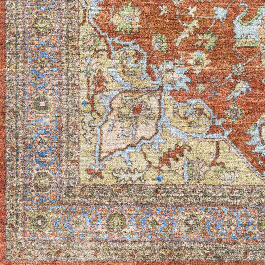 Close-up of the Bacoor Washable Area Rug, showcasing its brick red, beige, and denim traditional oriental pattern. Swatch