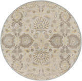 Close-up of round Conesus 1192 rug. Hand-tufted wool rug in ivory, taupe, light brown, and pale blue with floral pattern. Design-Round-8