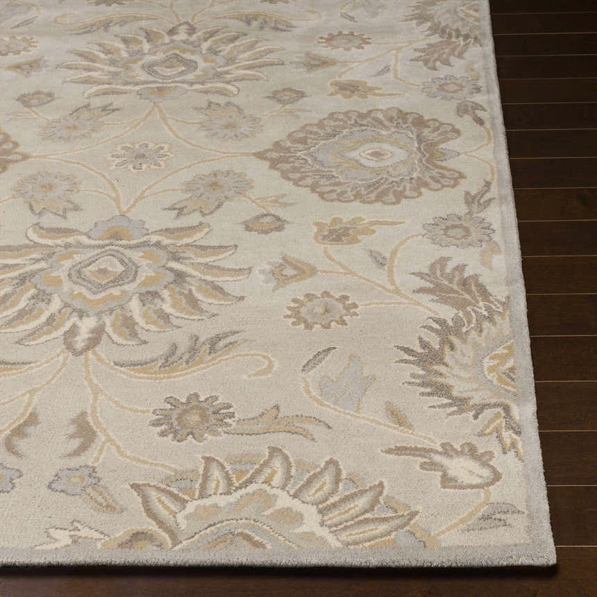 Close-up of the hand-tufted Conesus 1192 Ivory & Taupe Wool Rug. Features a traditional floral pattern in ivory, tan, and taupe. Front