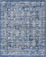 Close-up of the Michie Dark Blue Area Rug, featuring a distressed Bohemian-style white pattern on a dark blue background. Design-Rectangle-71010