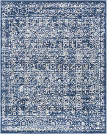 Close-up of the Michie Dark Blue Area Rug, featuring a distressed Bohemian-style white pattern on a dark blue background. Design-Rectangle-71010