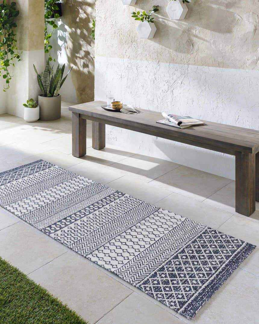 Hallway scene with Barnwood Washable Area Rug, wood bench, plants, and neutral tones. Bohemian style. Roomscene-Runner