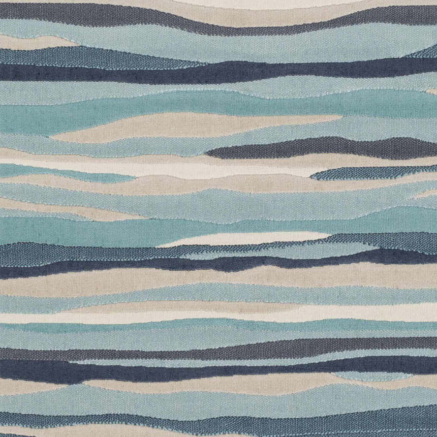 Close-up of the Basco Area Rug showcasing its contemporary wavy stripe design in aqua, charcoal, beige, and blue tones. Swatch