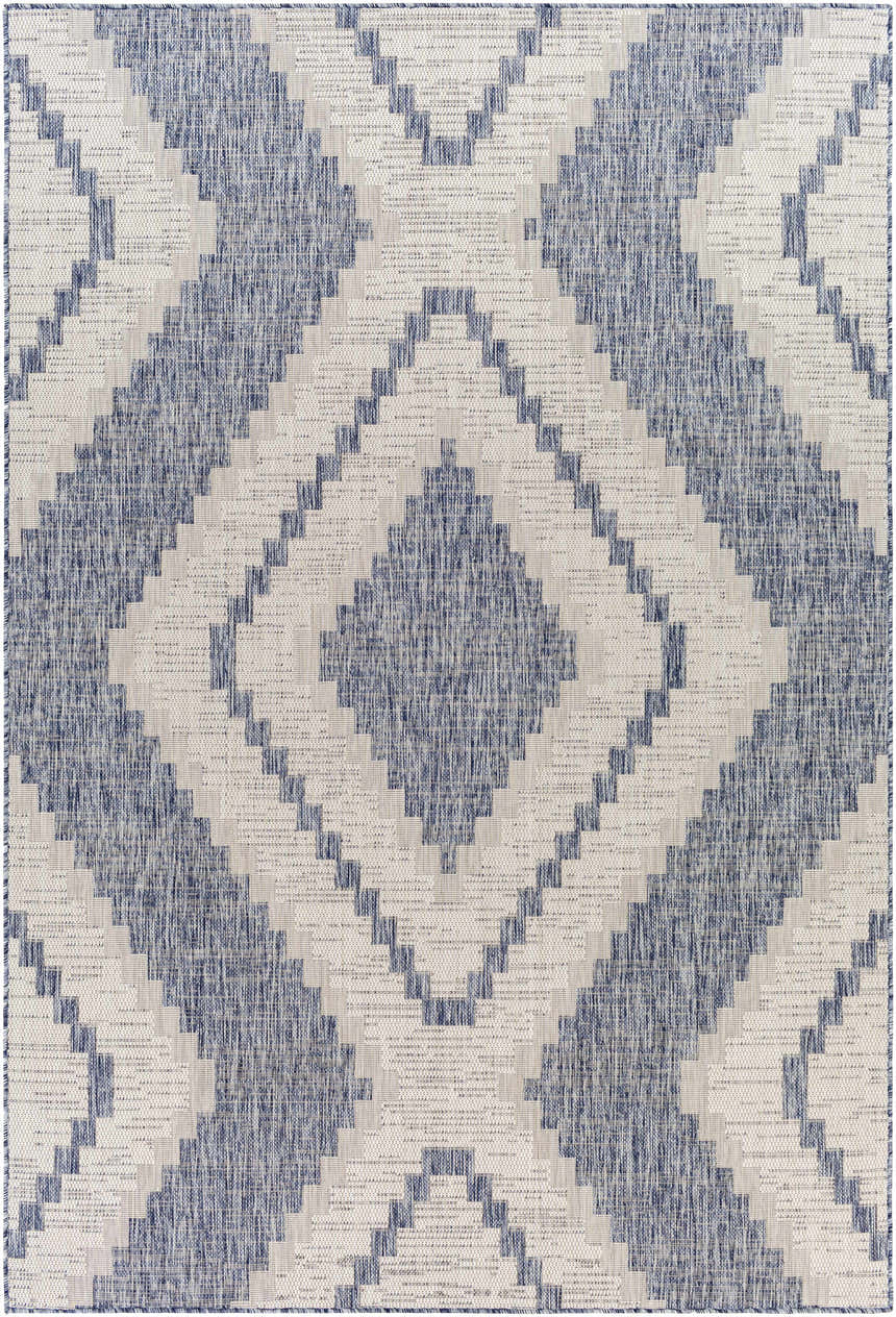 Close-up of McCrory Pale Blue Flat Rug. Geometric diamond pattern in pale blue, navy, and off-white. Machine woven texture. Design-Rectangle-537