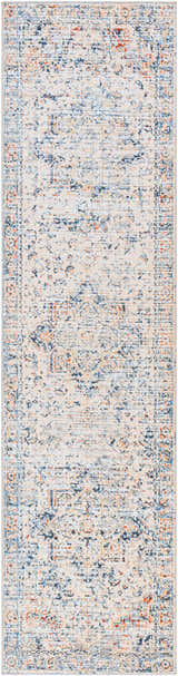 Close-up of the Bayog Area Rug, a machine-woven rug with brick red, cream, denim, and gray tones in a traditional pattern. Design-Runner-2610