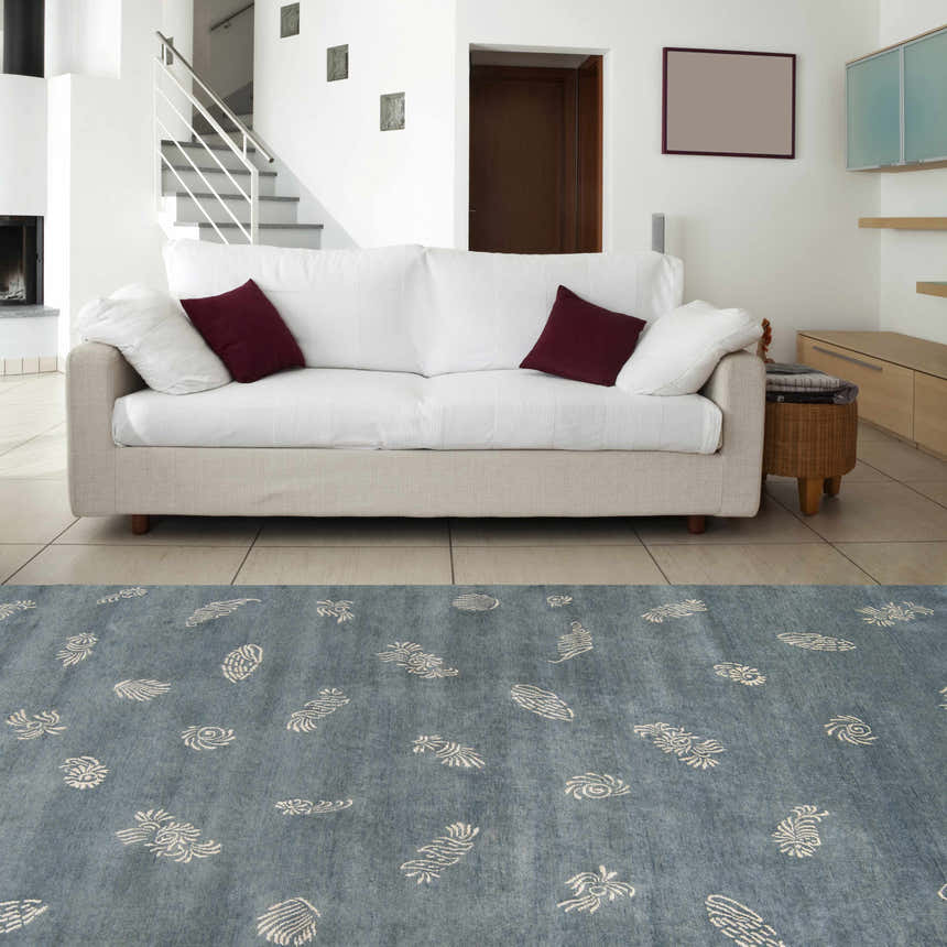 Living room scene with a blue Beach Area Carpet, white sofa, and modern decor. Roomscene-Rectangle