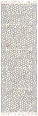 Close-up of Bealeton Area Rug. Slate gray rug with cream geometric diamond pattern and fringe. Hand woven cotton rug. Design-Runner-268