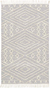 Close-up of Bealeton Area Rug. Cream diamond pattern on slate gray, hand-woven cotton rug with fringe. Design-Rectangle-576