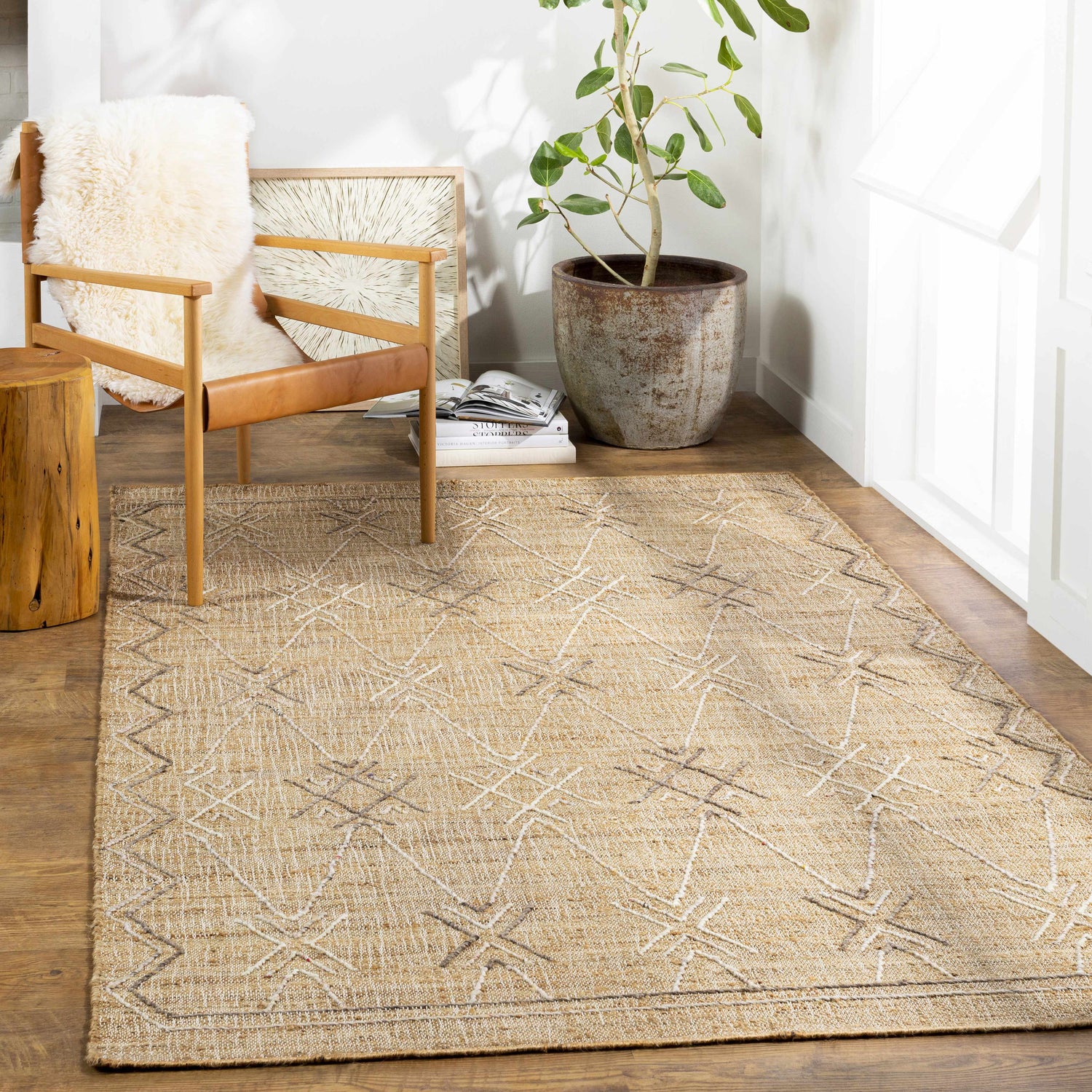 Farmhouse style room with a jute Beatrice Area Rug, wood chair, and potted plant. Roomscene-Rectangle