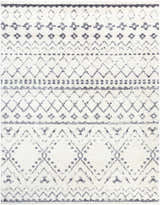 Close-up of the Benezett Area Rug, a white shag rug with a gray bohemian-inspired geometric pattern. Design-Rectangle-710103