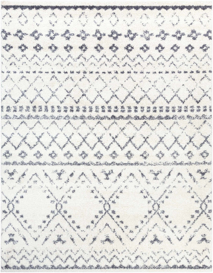 Close-up of the Benezett Area Rug, a white shag rug with a gray bohemian-inspired geometric pattern. Design-Rectangle-710103