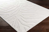 Close-up of the Benzonia 3D White Zebra Rug showing its light beige color and textured zebra stripe pattern. Corner