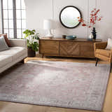 Living room scene with a blush Bergman Distressed Red Area Rug, sofa, wood cabinet, and modern decor. Roomscene-Rectangle