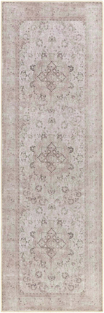 Close-up of the Bethany Vintage Flat Pile Washable Rug, featuring a traditional floral pattern in beige, blush, and olive tones. Design-Runner-27710