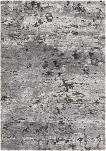 Close-up of the Bilston Boutique Thick Luxe Rug, showcasing its black, charcoal, gray, and ivory contemporary design. Design-Rectangle-5373