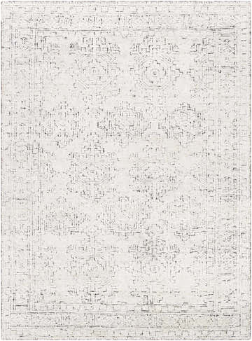 Close-up of the Blackfoot Area Rug. Hand-knotted, farmhouse style rug in black and white with a traditional rectangular pattern. Design-Rectangle-69