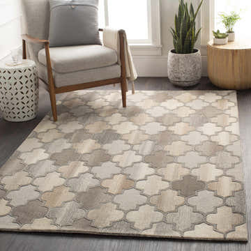 Living room scene with Bluffdale rug, gray armchair, and neutral decor. Contemporary style. Roomscene-Rectangle