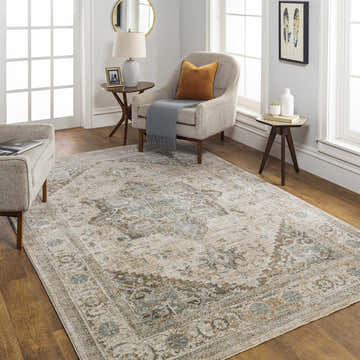 Living room with the Ballisodare Thick Luxe Boutique Rug in beige, sage, and charcoal. Traditional rug with armchairs. Roomscene-Rectangle