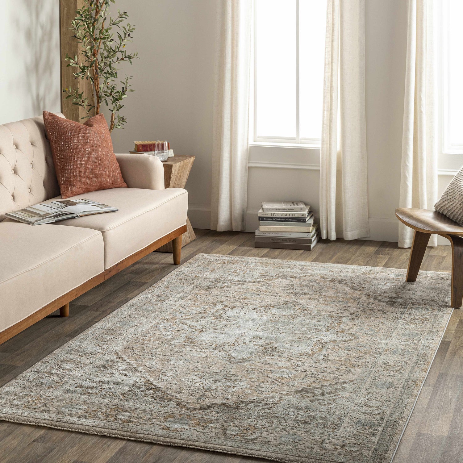 Living room with a beige sofa and Ballisodare Thick Luxe Boutique Rug in light beige, gray, and taupe oriental pattern. Roomscene-Rectangle