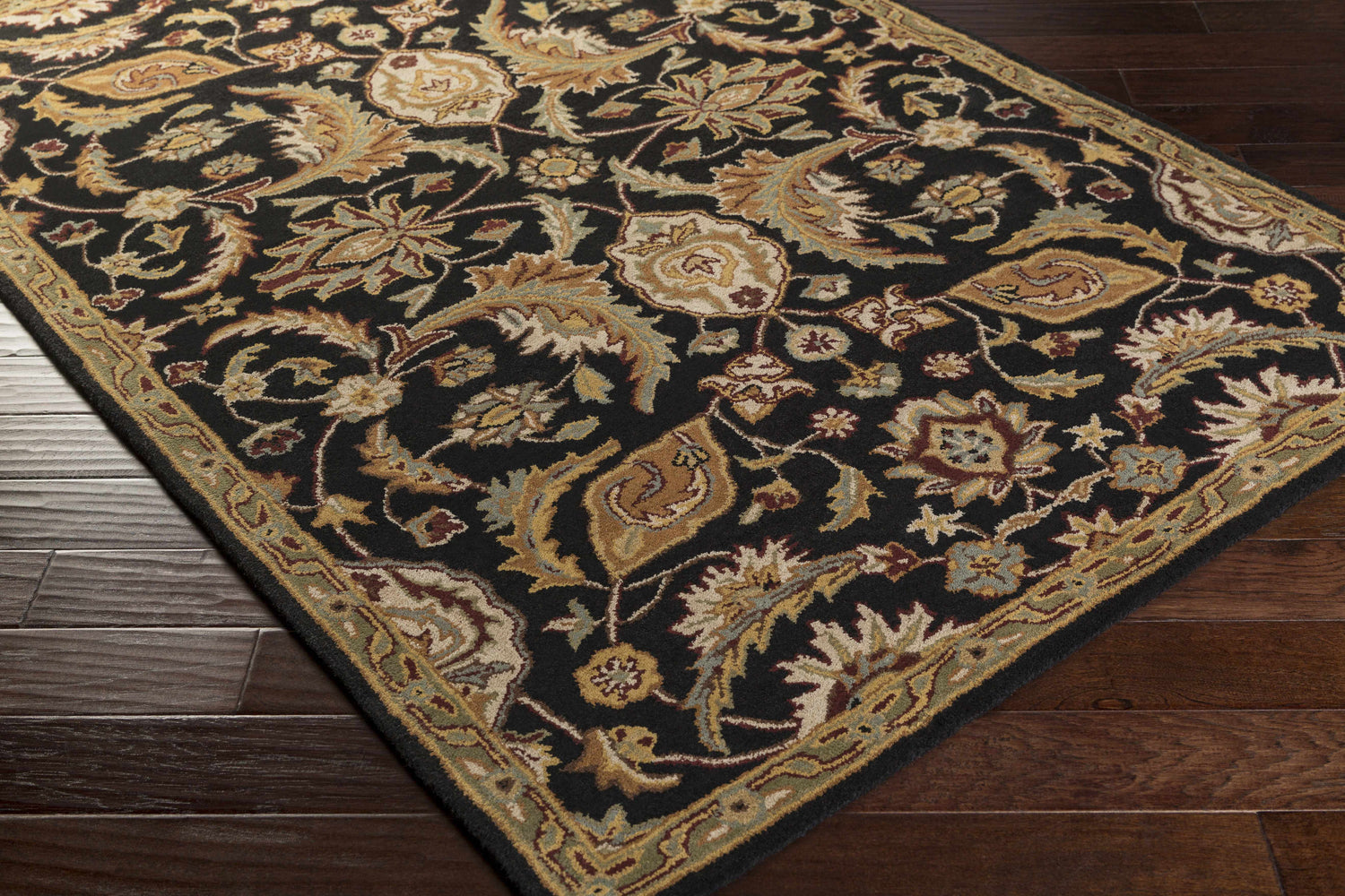 Close-up of a Blomkest Black&Yellow Traditional Wool Carpet, featuring a floral pattern in beige, gold, and burgundy. Corner