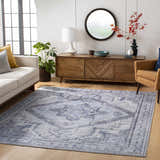 Living room scene with ivory sofa and blue Boon Area Rug. Farmhouse style with wood accents. Roomscene-Rectangle