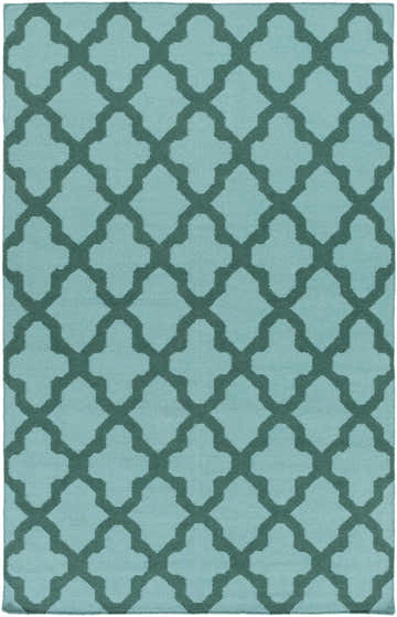 Close-up of the Boles Area Carpet. Sky blue wool rug with a teal quatrefoil pattern, hand woven. Design-Rectangle