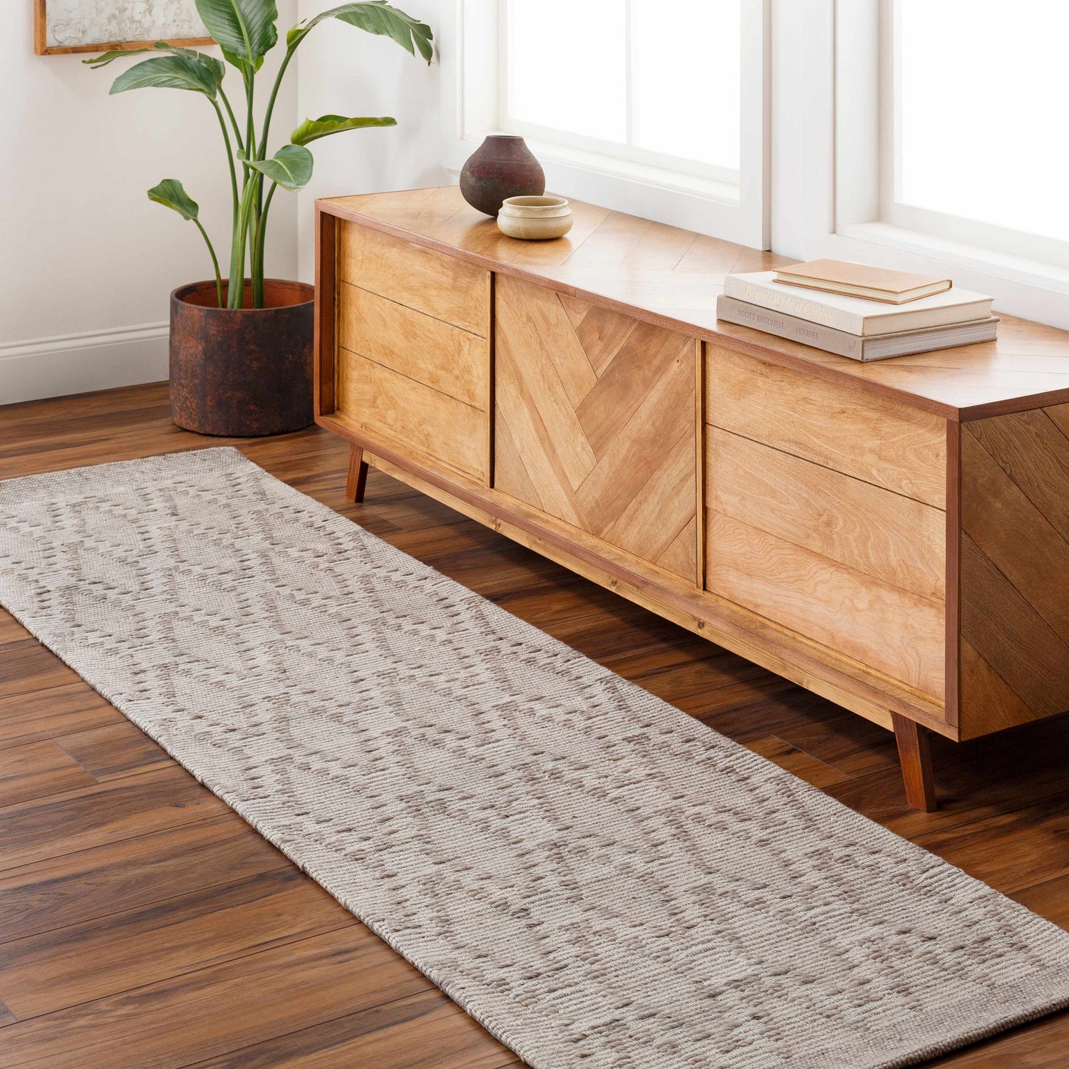 Farmhouse style entry with a mocha and off white Boys Area Rug runner and wood console table. Roomscene-Runner