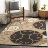 Living room scene with neutral armchair and the beige and brown Bray Area Rug featuring a contemporary swirl pattern. Roomscene-Rectangle