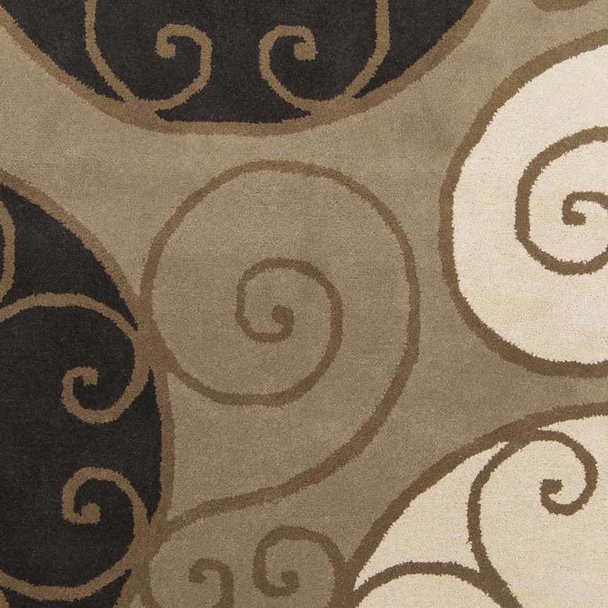 Close-up of the Bray Area Rug showing beige, brown, and black swirls on a soft, textured wool surface. Swatch