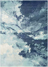 Close-up of the Bright Sky Indoor/Outdoor Rug with a contemporary abstract design in ivory, light slate, navy, and pale blue. Design-Rectangle-5373